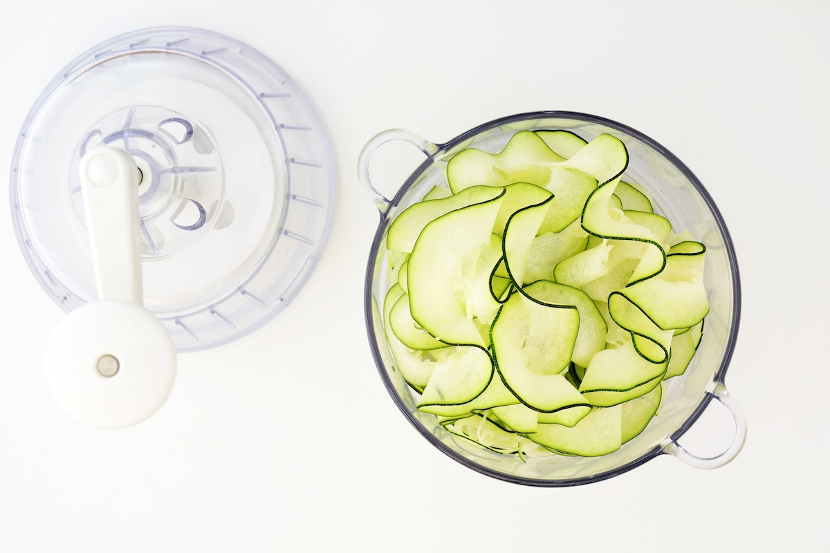Zucchini,Ribbons,Using,Spiralizer,On,White,Background,In,Flat,Lay Zucchini,Ribbons,Using,Spiralizer,On,White,Background,In,Flat,Lay