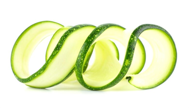 Delicate,Thin,Curled,Spiral,Ribbon,Of,Fresh,Raw,Green,Zucchini