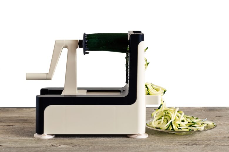 Lateral,View,Of,Vegetable,Spiralizer,Making,Raw,Zucchini,Noodles,(zoodles)