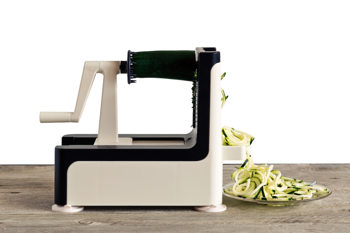 Lateral,View,Of,Vegetable,Spiralizer,Making,Raw,Zucchini,Noodles,(zoodles) Lateral,View,Of,Vegetable,Spiralizer,Making,Raw,Zucchini,Noodles,(zoodles)