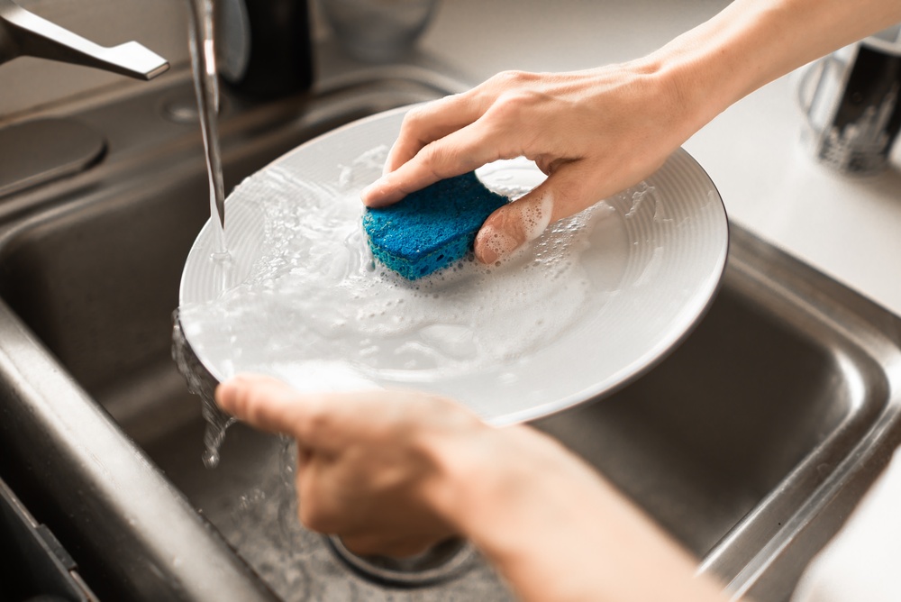 Washing,Dishes,In,Kitchen,Sink,With,Sponge,,Daily,Routine,And