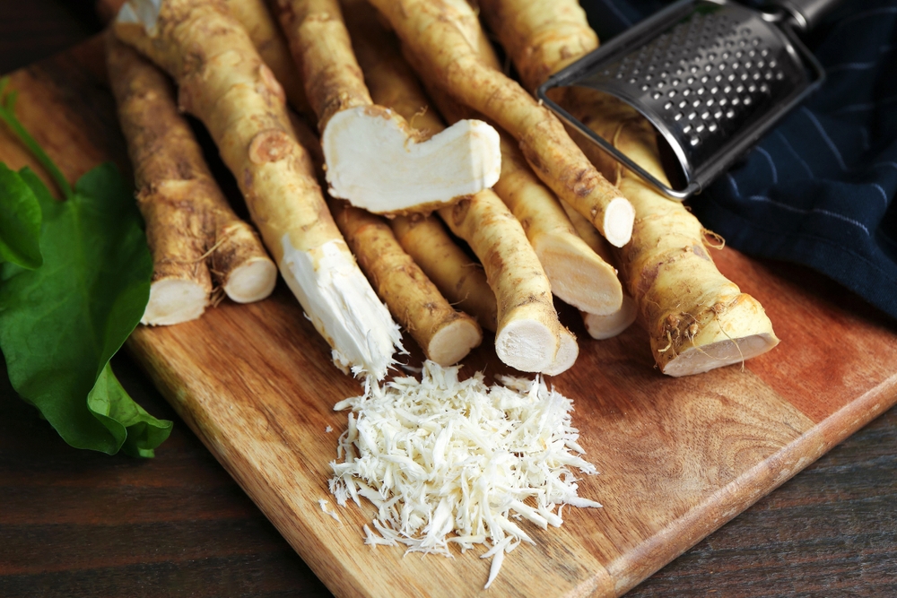 Grated,Horseradish,,Grater,,Leaves,And,Fresh,Roots,On,Wooden,Table, Grated,Horseradish,,Grater,,Leaves,And,Fresh,Roots,On,Wooden,Table,