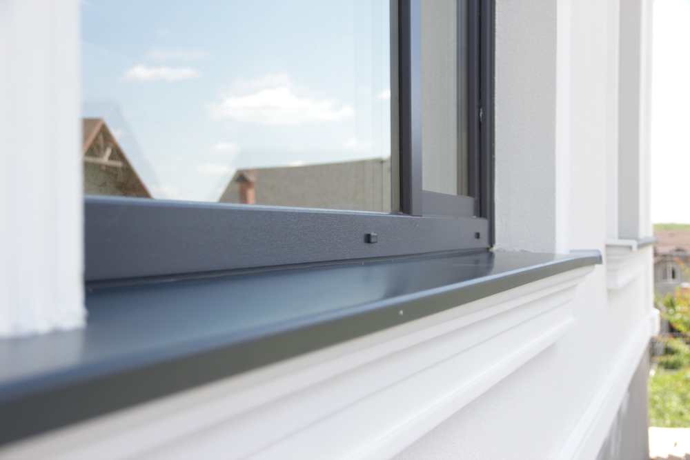 Exterior,Antracit,Window,Aluminium,Sill,In,A,White,Facade,Building Exterior,Antracit,Window,Aluminium,Sill,In,A,White,Facade,Building