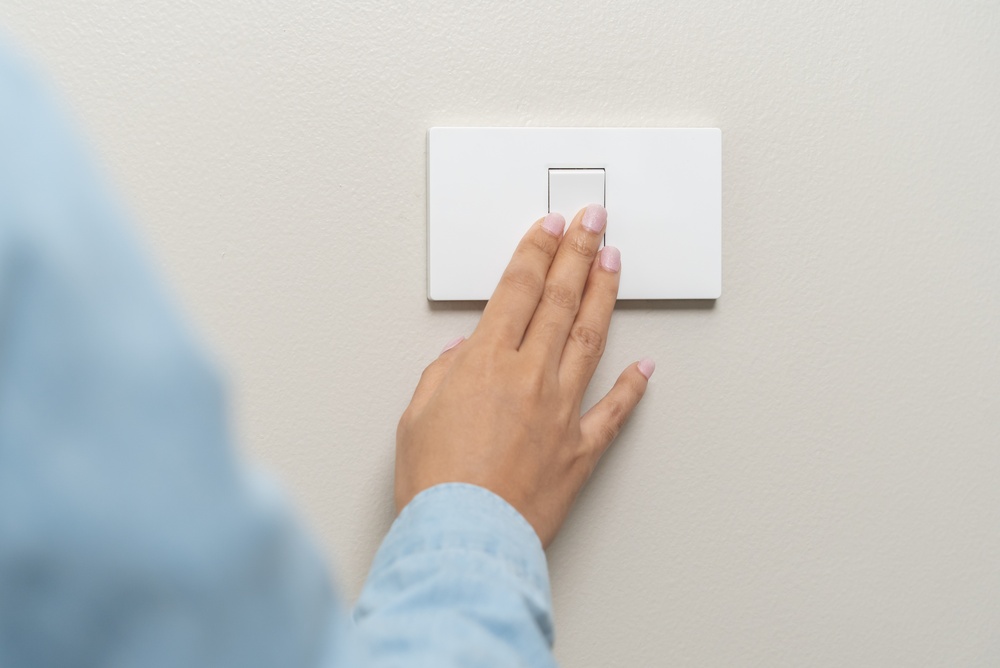 Asian,Young,Woman,Hand,Turn,Off,On,Lighting,Switch,At Asian,Young,Woman,Hand,Turn,Off,On,Lighting,Switch,At