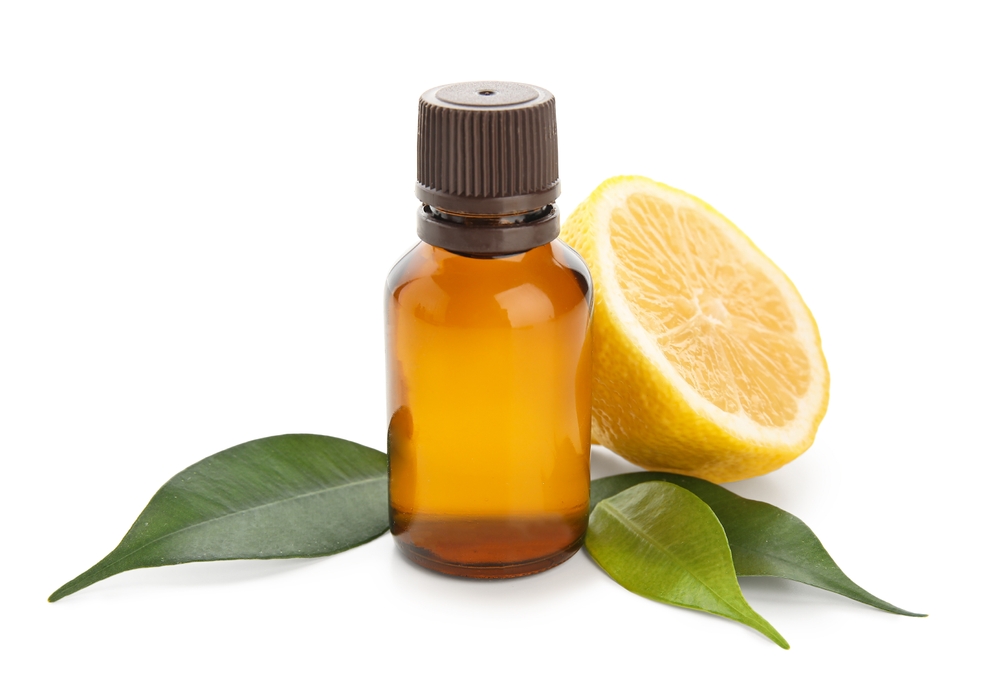 Bottle,Of,Lemon,Essential,Oil,Isolated,On,White,Background,,Closeup Bottle,Of,Lemon,Essential,Oil,Isolated,On,White,Background,,Closeup