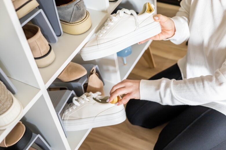 Female,Hands,Choosing,Boots,Shoe,Cupboard,Comfortable,Storage,Organize,Closeup
