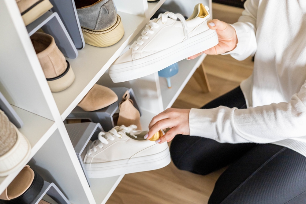 Female,Hands,Choosing,Boots,Shoe,Cupboard,Comfortable,Storage,Organize,Closeup Female,Hands,Choosing,Boots,Shoe,Cupboard,Comfortable,Storage,Organize,Closeup